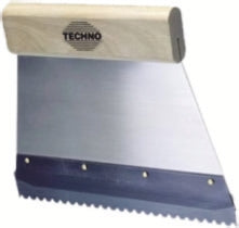 Spatule dentée à écrou