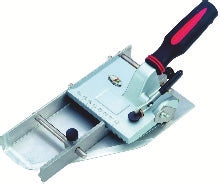 Coupe-bande pour tapis